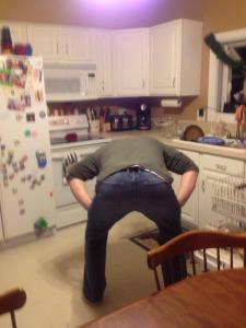 You may see a smartass, I see a man unloading the dishwasher.