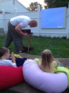 Outdoor movie night...Come on!!!  Suck at something will ya?!
