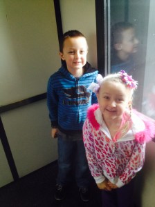 Look at us in the dirty parking garage elevator!  Don't step in the pee!